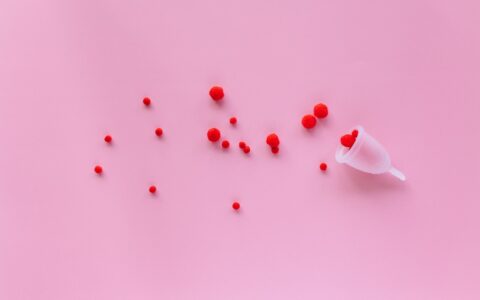 Red beads with white plastic cup