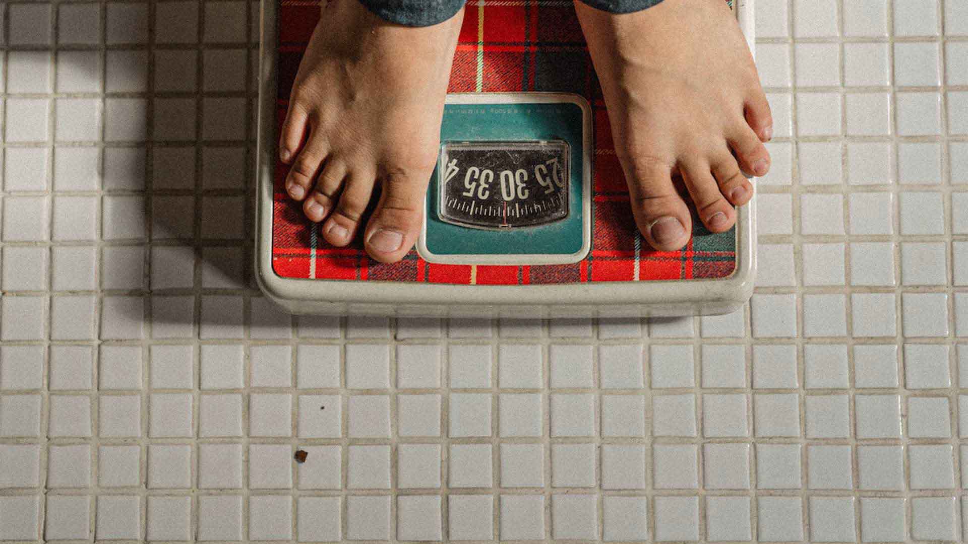 someone standing on a scale